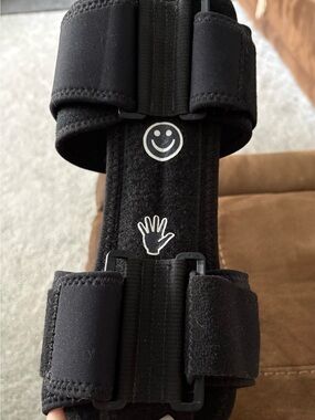 Comfort land Adjustable Black Wrist Brace with Smiley & Hand Icons